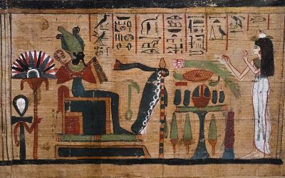 Decorated ancient Egyptian papyrus with hieroglyphs and funerary scenes in the Egyptian Museum